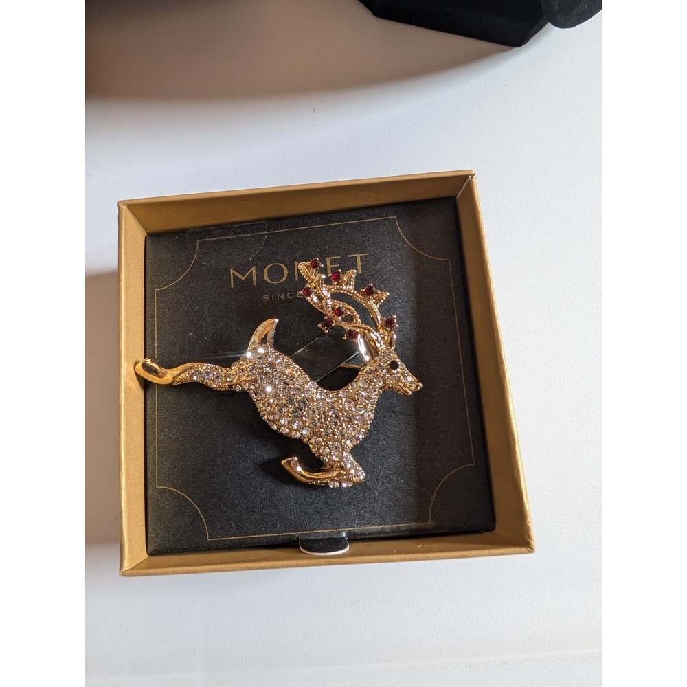 VINTAGE MONET SIGNED Leaping Christmas Reindeer Red Clear‎ Rhinestone Brooch Pin